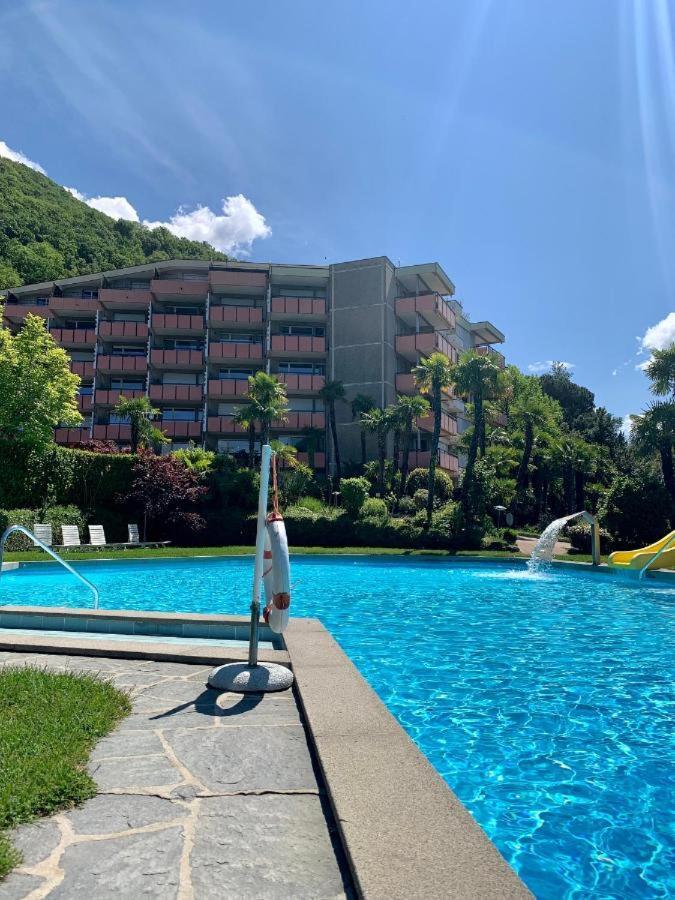 Luganersee, Pool, Strand, Parkplatz, Suite 204 Биссоне Экстерьер фото